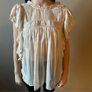 Cream colored shirt with detail